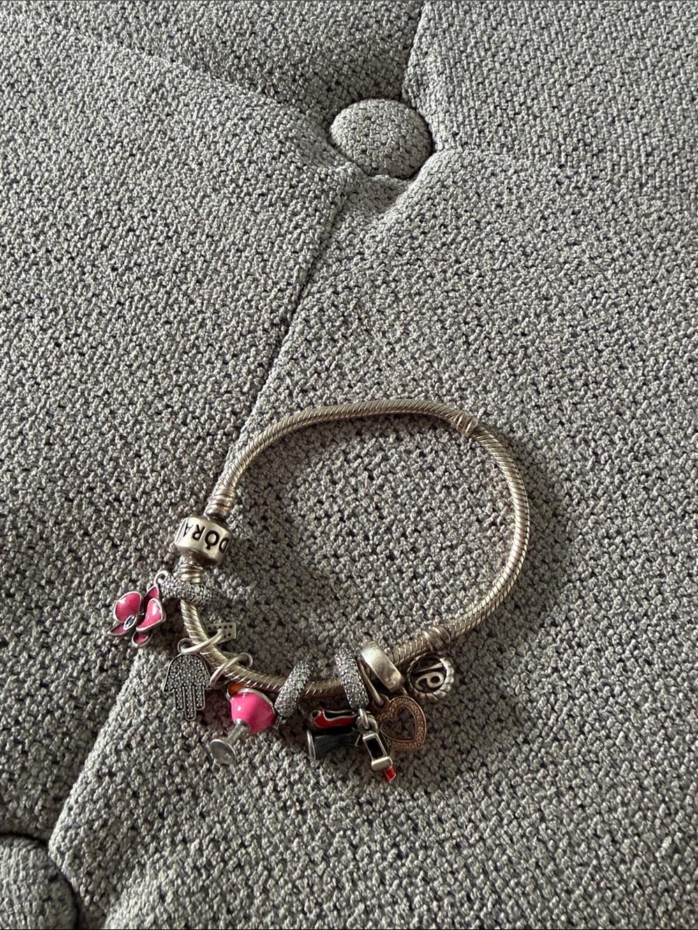Pandora Silver Charm Bracelet with Pink Accents and Mixed Charms